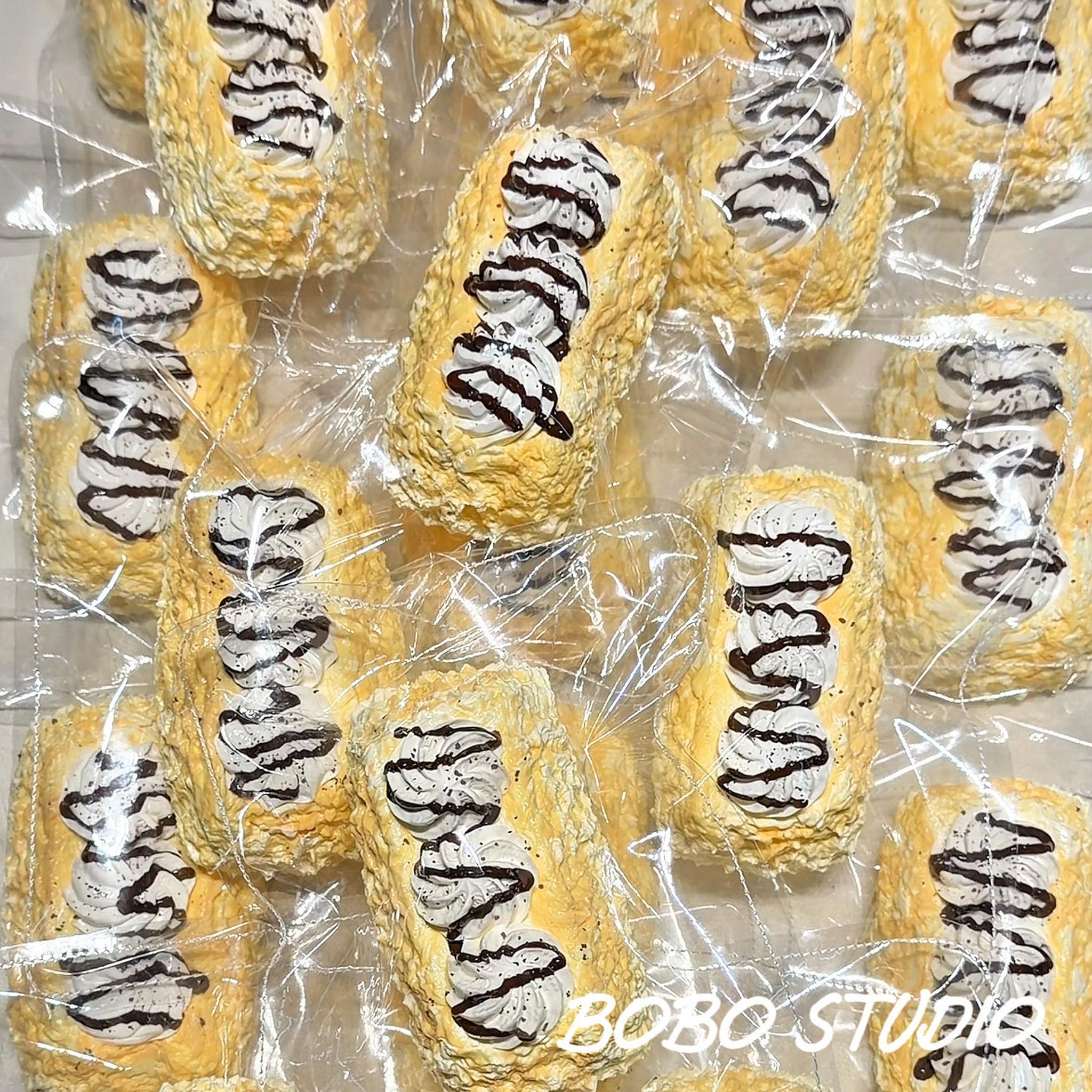Creamy Chocolate Drizzle Eclair Taba Squishy Fidget Toy Главное изображение товара