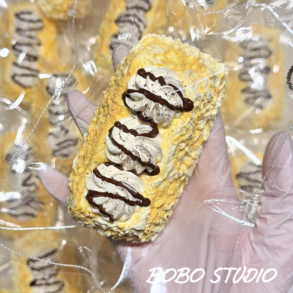 Creamy Chocolate Drizzle Eclair Taba Squishy Fidget Toy