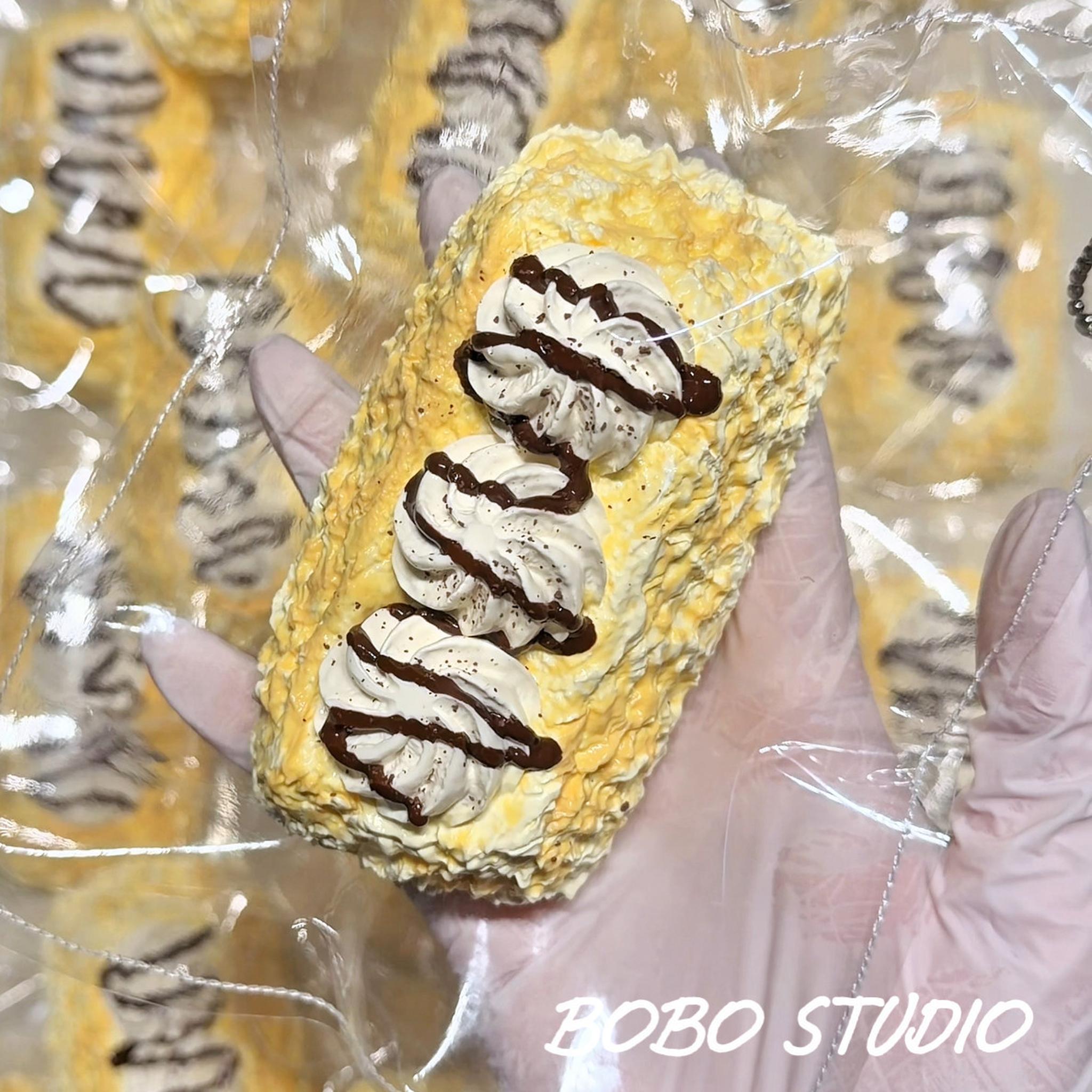 Creamy Chocolate Drizzle Eclair Taba Squishy Fidget Toy
