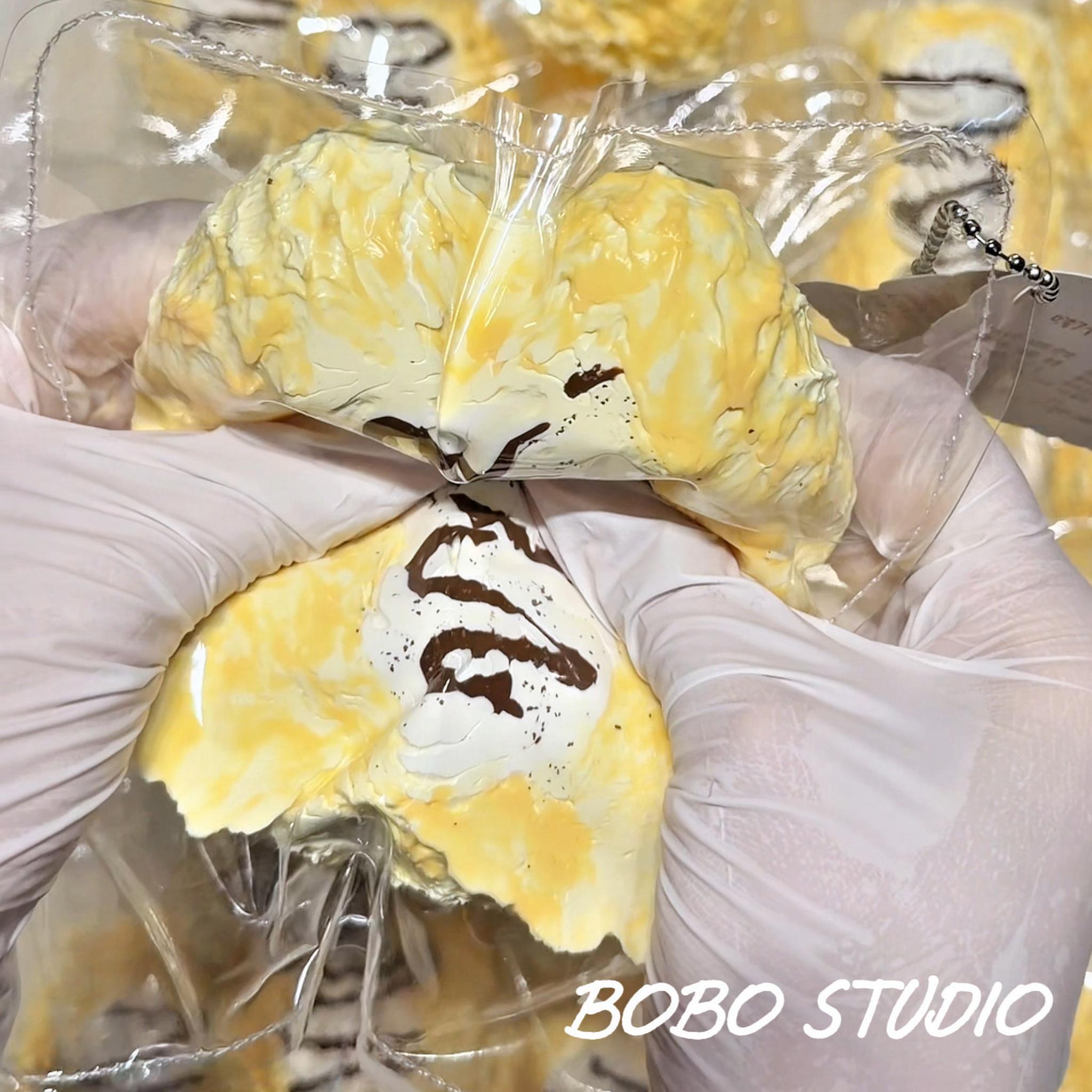 Creamy Chocolate Drizzle Eclair Taba Squishy Fidget Toy